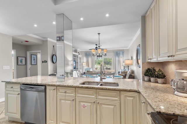 kitchen featuring sink, stainless steel dishwasher, cream cabinetry, and light stone countertops