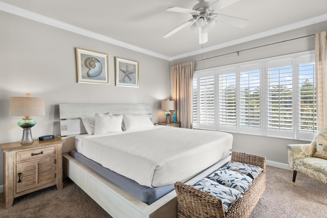 carpeted bedroom with ornamental molding and ceiling fan