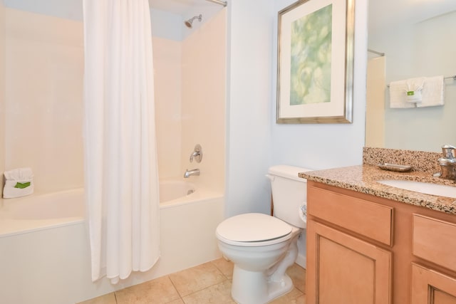 full bathroom with shower / tub combo, vanity, tile patterned floors, and toilet