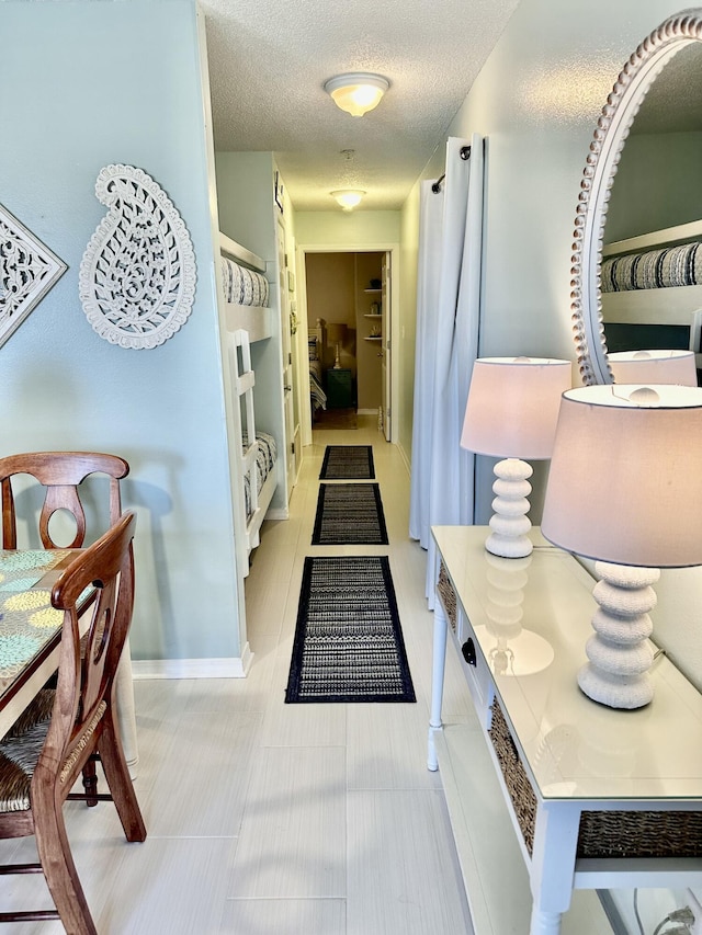 interior space featuring a textured ceiling