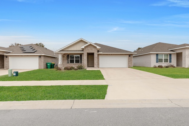 view of front of property with a garage and a front yard