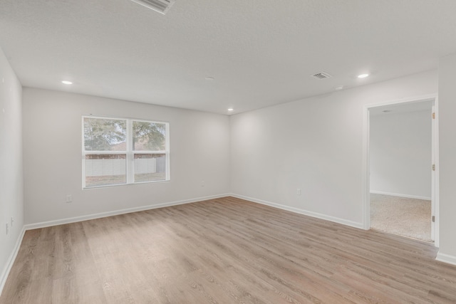 empty room featuring light hardwood / wood-style flooring