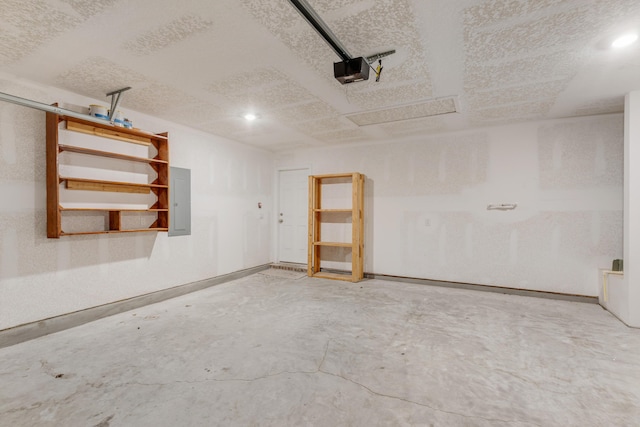 interior space featuring electric panel and concrete floors