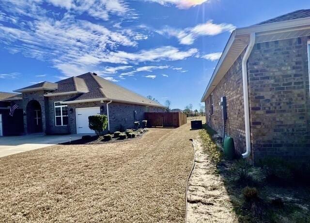 view of home's exterior featuring a garage