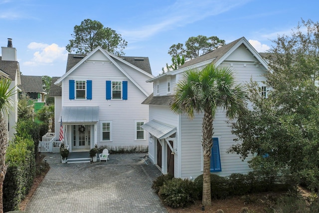 view of front of property with a garage