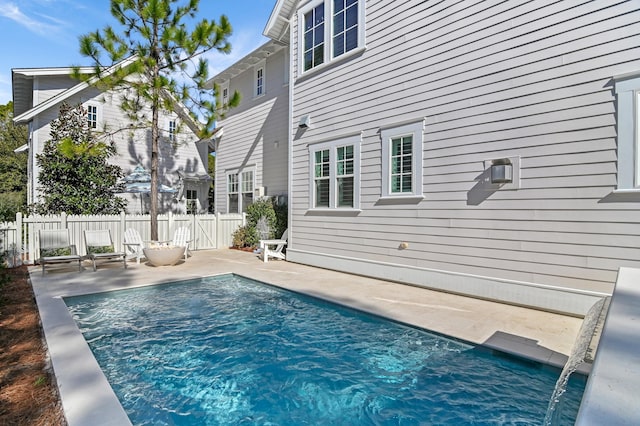 view of pool featuring a patio and pool water feature