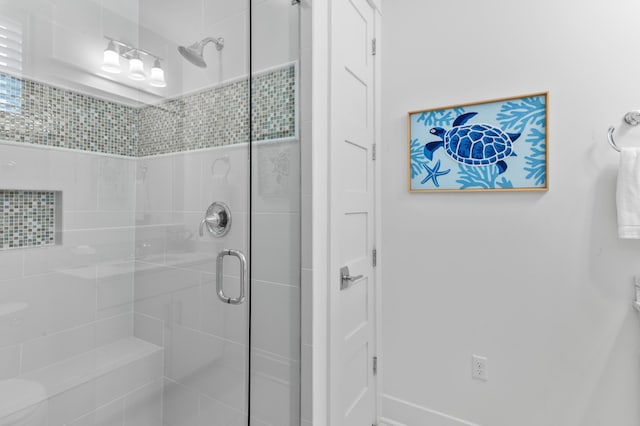 bathroom with an enclosed shower