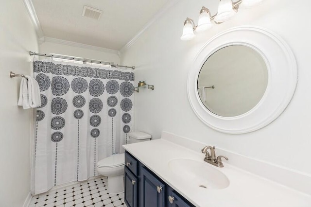 bathroom featuring ornamental molding, vanity, and toilet