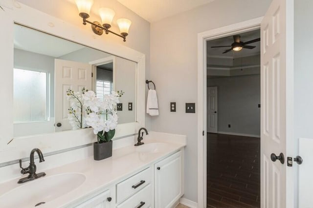 bathroom featuring vanity and hardwood / wood-style floors