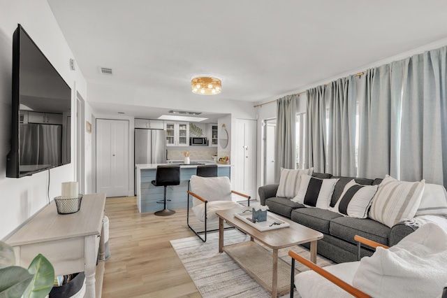 living room featuring light hardwood / wood-style flooring