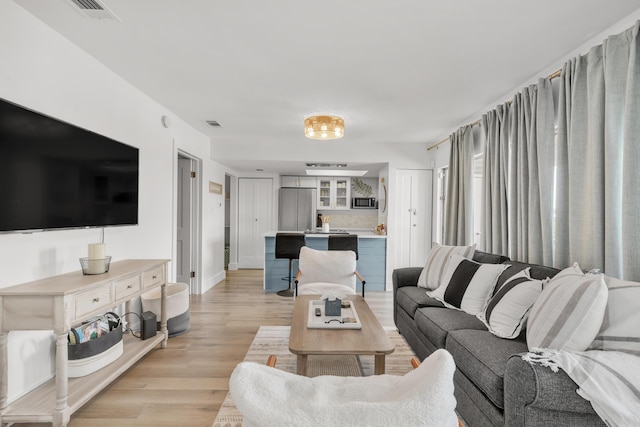 living room featuring light hardwood / wood-style floors