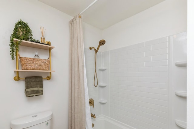 bathroom with toilet and shower / bath combo with shower curtain