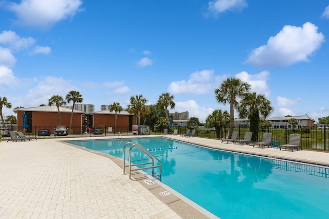 view of swimming pool featuring a patio