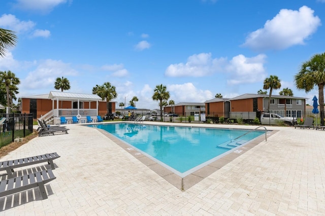 view of pool featuring a patio