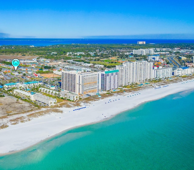 bird's eye view with a view of the beach and a water view