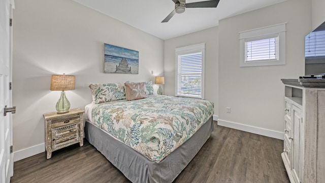 bedroom featuring dark wood-type flooring and ceiling fan