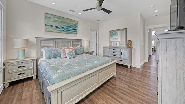 bedroom with dark wood-type flooring and ceiling fan