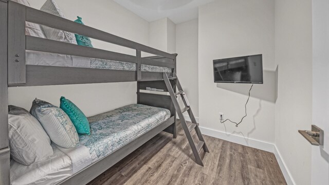 bedroom featuring hardwood / wood-style floors