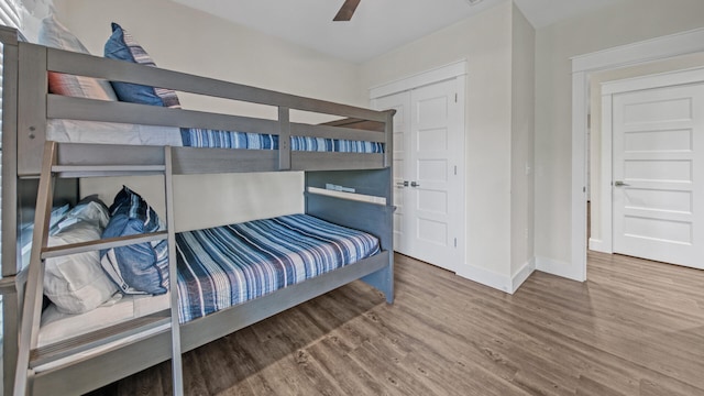 bedroom featuring hardwood / wood-style flooring and ceiling fan