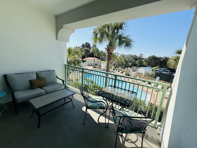 balcony with an outdoor hangout area