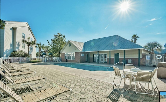 view of pool featuring a patio area