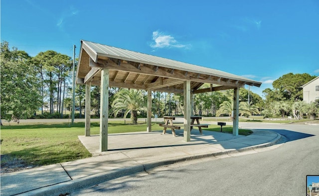 view of home's community featuring a gazebo and a lawn