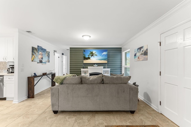 tiled living room featuring ornamental molding