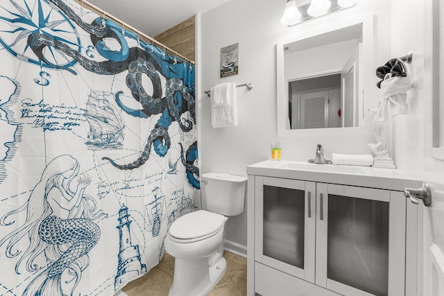 bathroom with vanity, curtained shower, tile patterned floors, and toilet