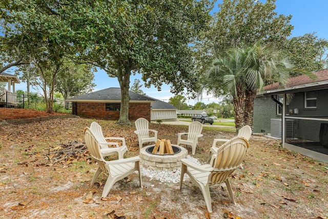 view of patio / terrace with an outdoor fire pit