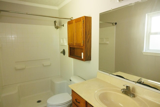 bathroom featuring ornamental molding, vanity, walk in shower, and toilet