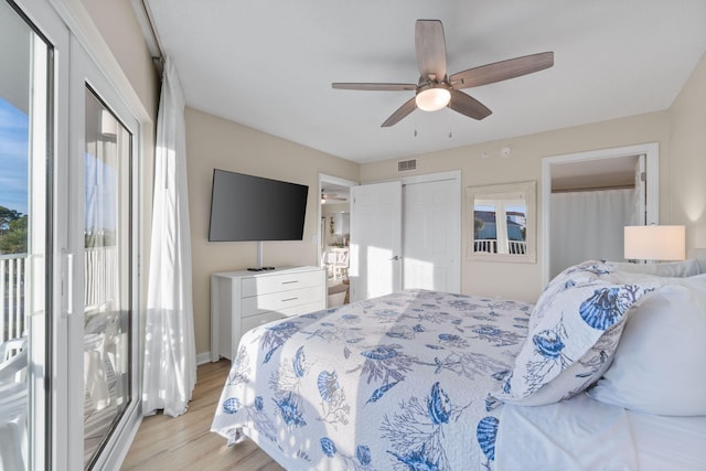 bedroom featuring ceiling fan, light hardwood / wood-style floors, and access to outside