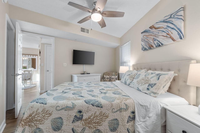 bedroom featuring ceiling fan and light wood-type flooring