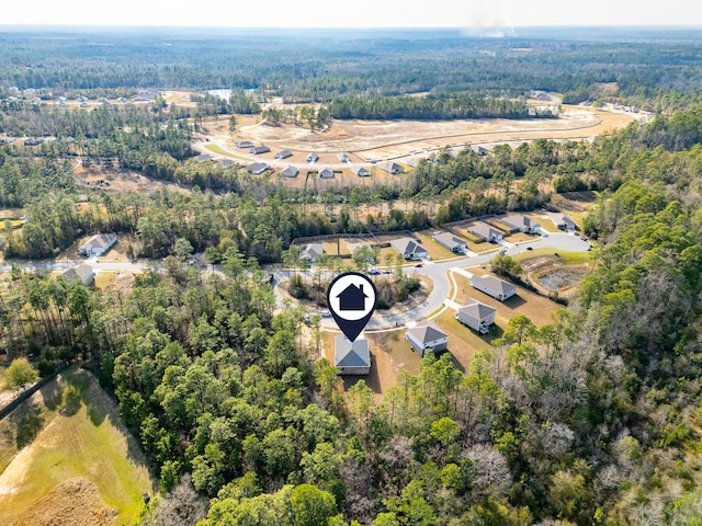 aerial view featuring a forest view