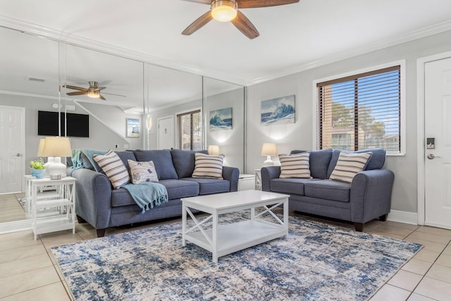 tiled living room with crown molding and ceiling fan