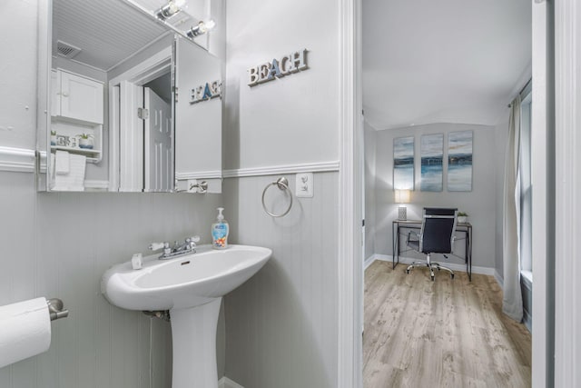 bathroom featuring wood-type flooring