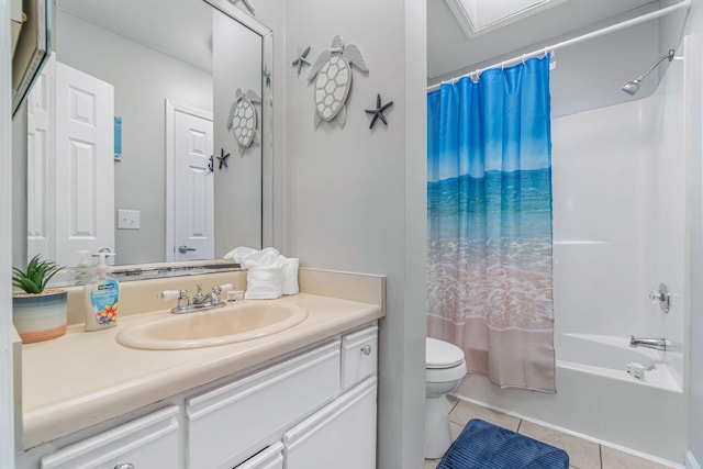 full bathroom with tile patterned floors, toilet, shower / bath combo with shower curtain, and vanity