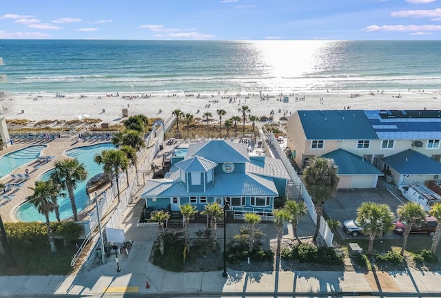 aerial view featuring a water view and a beach view