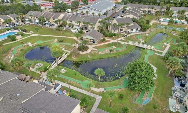 drone / aerial view featuring a water view