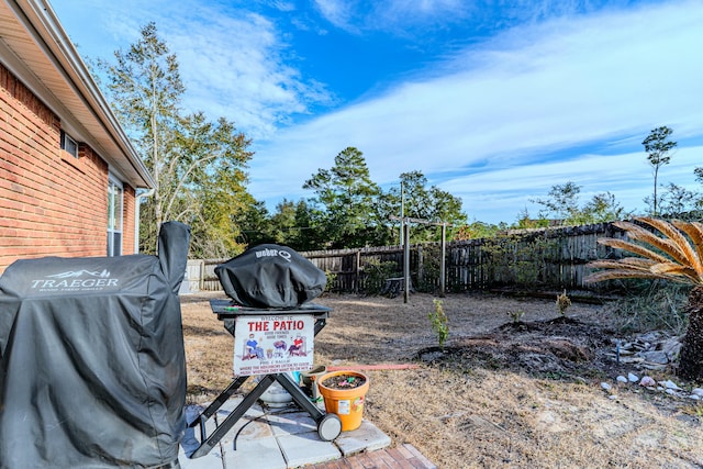 view of yard with a fenced backyard