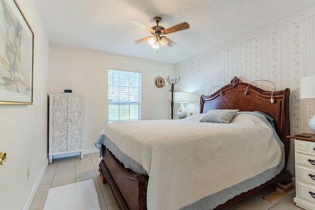 bedroom with a textured ceiling, baseboards, light tile patterned flooring, and wallpapered walls