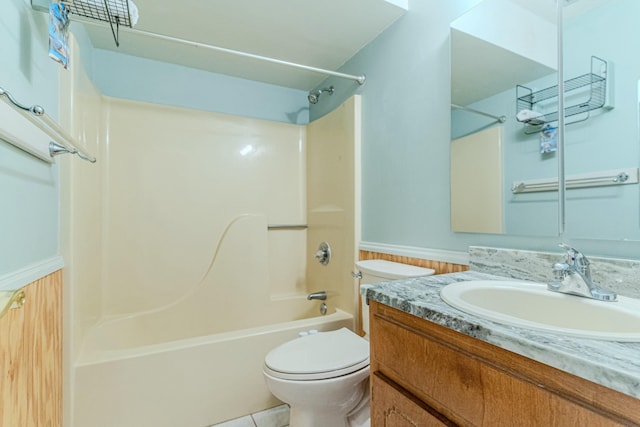 bathroom featuring shower / bath combination, vanity, toilet, and tile patterned floors