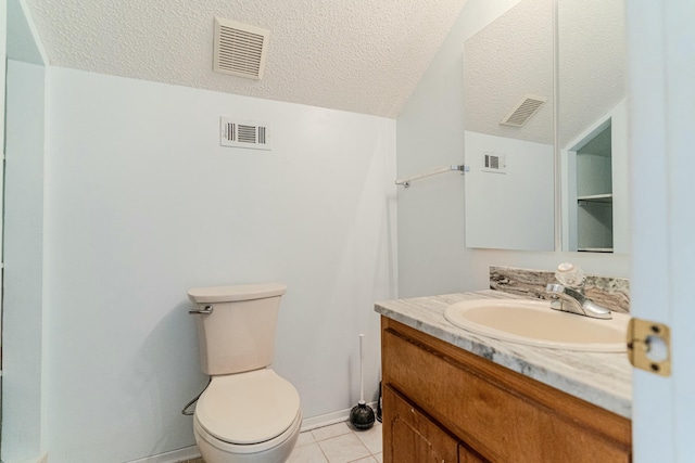 half bath featuring a textured ceiling, vanity, and visible vents