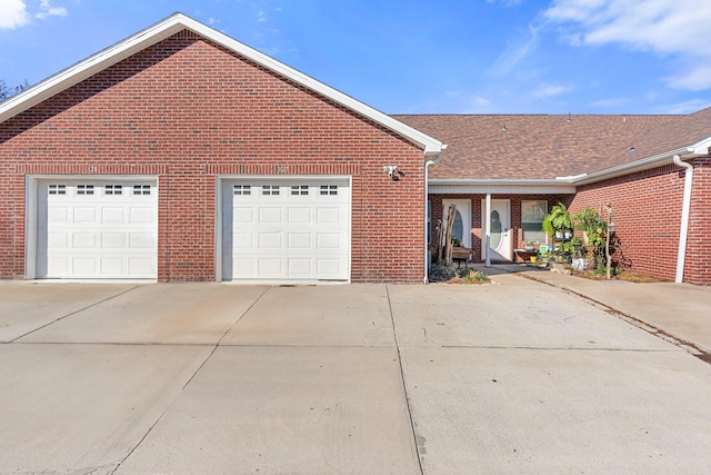 ranch-style house featuring a garage