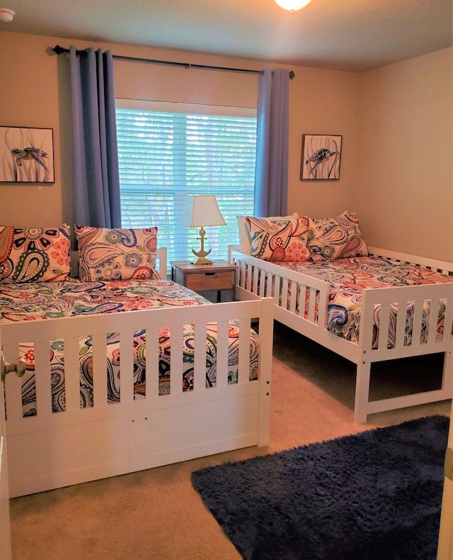 bedroom featuring carpet floors