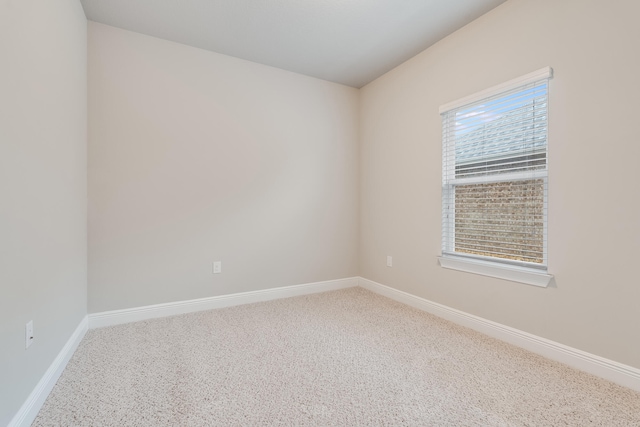 unfurnished room with carpet