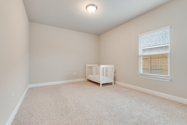 unfurnished bedroom with carpet