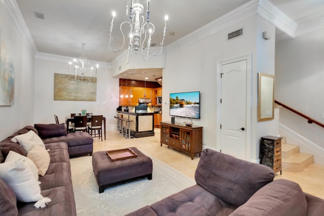 tiled living room featuring crown molding and a notable chandelier