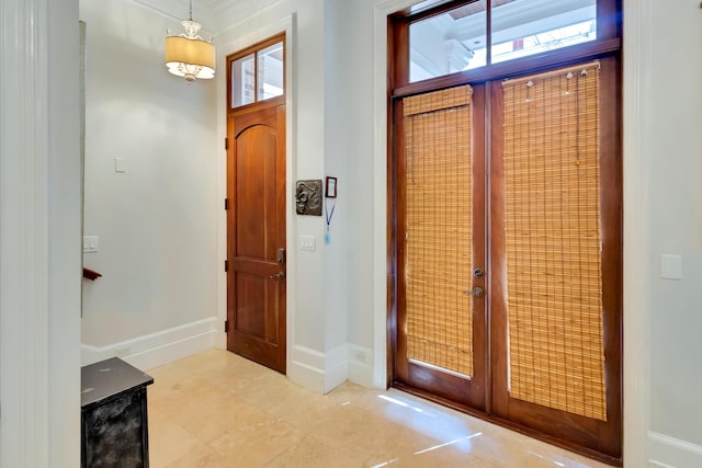 tiled entryway with french doors