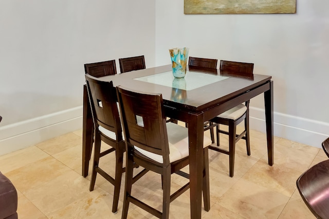 view of tiled dining space