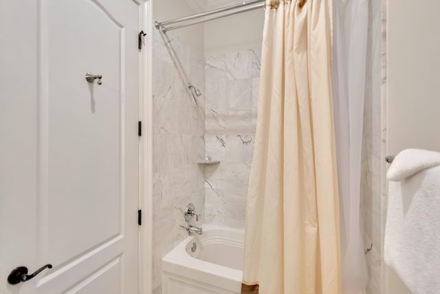 bathroom featuring shower / tub combo with curtain